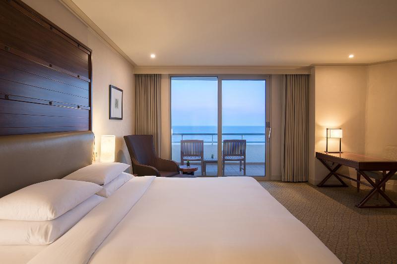 Parnas Hotel Jeju Seogwipo Exterior foto A guest room at the Hilton Sydney